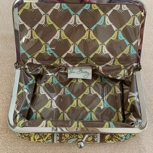 Vera Bradley small makeup/toiletry bag. Good condition. 7.5” L x 5” W x 2.5” D.